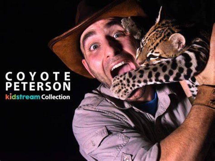 Coyote Peterson with a frog